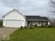 Charming single Gathering home with a welcoming front porch and attached garage at 130 Hanover Dr, Morristown, IN 46161