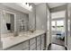 Modern bathroom with double vanity, quartz countertops, and a bright, welcoming atmosphere at 13610 Grand Abbey Way, Fishers, IN 46037