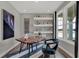 Stylized Study with large picture window, shelving, and a modern rug at 13610 Grand Abbey Way, Fishers, IN 46037