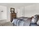 Bedroom with walk-in closet, chest of drawers, and modern furniture at 13622 Grand Abbey Way, Fishers, IN 46037