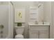 Cozy bathroom features a toilet, vanity with storage, and a shower-tub with a curtain at 13634 Grand Abbey Way, Fishers, IN 46037