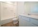 This bathroom features a shower/tub combination and a white vanity at 1366 Foxtail Ln, Greenwood, IN 46143