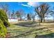 Large backyard featuring an open area for recreational activities and a shed for storage at 145 W Old South St, Bargersville, IN 46106