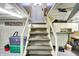 Stairwell leading to basement area with carpeted steps and open lighting at 145 W Old South St, Bargersville, IN 46106