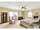 Spacious bedroom with natural light, comfortable seating, and stylish decor, enhancing its appeal at 145 W Old South St, Bargersville, IN 46106