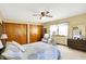 Bright bedroom featuring ceiling fan, window, and closet space for an organized retreat at 145 W Old South St, Bargersville, IN 46106