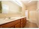 Bathroom with double sinks, tile floors, and a tub-shower combination at 1502 Heron Ridge Blvd, Greenwood, IN 46143