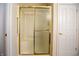 Bathroom with a shower/tub combo with sliding glass doors and a safety bar at 1502 Heron Ridge Blvd, Greenwood, IN 46143