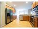 Well-equipped kitchen with stainless steel appliances and maple cabinets at 1502 Heron Ridge Blvd, Greenwood, IN 46143