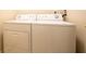 Modern white front-load washer and dryer set at 1502 Heron Ridge Blvd, Greenwood, IN 46143