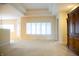 Bright, open living room with coffered ceilings and natural light at 1502 Heron Ridge Blvd, Greenwood, IN 46143