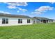 Expansive green backyard, perfect for outdoor activities and relaxation at 1627 Clover Crossing Dr, Greenfield, IN 46140