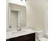Bathroom with a modern vanity, large mirror, and standard toilet at 1627 Clover Crossing Dr, Greenfield, IN 46140