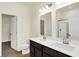 Bathroom featuring double sinks, a walk-in closet, and a shower at 1627 Clover Crossing Dr, Greenfield, IN 46140