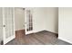 Office with hardwood floors and glass paneled doors at 1627 Clover Crossing Dr, Greenfield, IN 46140