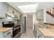 Charming kitchen features modern appliances and ample lighting at 2619 Chaseway Ct, Indianapolis, IN 46268