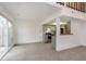 Bright living room with sliding glass door next to the kitchen at 2619 Chaseway Ct, Indianapolis, IN 46268