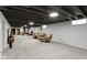 Spacious finished basement with carpet, recessed lighting and exposed ceiling at 2951 E 62Nd St, Indianapolis, IN 46220