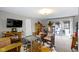 Inviting living room with glass table, neutral decor, wood furniture, sliding door, and natural light at 2951 E 62Nd St, Indianapolis, IN 46220