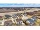 A neighborhood with well-maintained lawns and beautiful homes under a partly cloudy sky at 3924 Bear Creek Way, Carmel, IN 46074