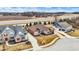 Stunning aerial view of well-spaced homes, lush green lawns, and a meticulously maintained landscape at 3924 Bear Creek Way, Carmel, IN 46074