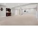 Expansive finished basement with a home bar, providing an open and inviting space for entertaining guests at 3924 Bear Creek Way, Carmel, IN 46074