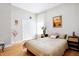 Cozy bedroom with light walls, hardwood floors, and ample closet space at 3924 Bear Creek Way, Carmel, IN 46074