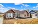 Attractive single-story home with a well-maintained front yard and landscaping at 3924 Bear Creek Way, Carmel, IN 46074