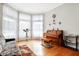Sunlit sitting room featuring large bay windows and a classic piano at 3924 Bear Creek Way, Carmel, IN 46074