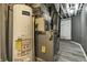 View of the mechanicals of the house, including the furnace and water heater at 4249 Dubarry Rd, Indianapolis, IN 46226