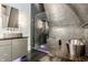 Contemporary bathroom featuring mosaic tiled walls, glass shower, sleek vanity, and a modern freestanding tub at 501 Fletcher Ave # D, Indianapolis, IN 46203