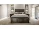 This bedroom is a spacious retreat, furnished with a large bed, matching nightstands and mirrored wall decor at 501 Fletcher Ave # D, Indianapolis, IN 46203