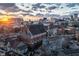 Aerial view of a brick church with a sunset view of downtown buildings in the background at 501 Fletcher Ave # D, Indianapolis, IN 46203
