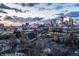 A long aerial view of a brick church with downtown buildings in the background under a cloudy sky at 501 Fletcher Ave # D, Indianapolis, IN 46203