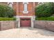 Garage in brick building surrounded by green bushes at 501 Fletcher Ave # D, Indianapolis, IN 46203