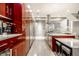 Sleek kitchen featuring modern design, island with seating, and stainless steel appliances at 501 Fletcher Ave # D, Indianapolis, IN 46203
