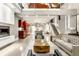 The open concept living room is bright with hardwood floors, gray walls, and modern, comfortable furniture at 501 Fletcher Ave # D, Indianapolis, IN 46203
