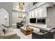Spacious living room with high ceilings, a fireplace and a great view through large windows at 501 Fletcher Ave # D, Indianapolis, IN 46203