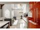 Bright living space featuring an open concept layout with modern kitchen and high ceilings at 501 Fletcher Ave # D, Indianapolis, IN 46203