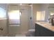 Bathroom featuring a glass door shower, vanity and a toilet at 516 Northfield Dr, Lebanon, IN 46052