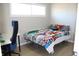 Bedroom features a large window, and a comfortable bed at 516 Northfield Dr, Lebanon, IN 46052