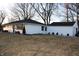 Well-maintained home with a detached garage and neatly trimmed shrubbery at 516 Northfield Dr, Lebanon, IN 46052