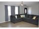 Comfortable living room with a large sectional sofa, neutral decor, and plenty of natural light at 516 Northfield Dr, Lebanon, IN 46052
