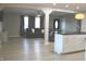 Spacious open-concept living space with a modern kitchen and comfortable seating area at 516 Northfield Dr, Lebanon, IN 46052