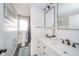 Bright bathroom featuring a double vanity with a white countertop and modern fixtures at 540 Barnett Ct, Whiteland, IN 46184