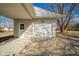 A detached one-car garage with white siding and an access door at 540 Barnett Ct, Whiteland, IN 46184