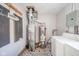 Interior view of a laundry room with gray flooring, utility tub, and washer and dryer at 540 Barnett Ct, Whiteland, IN 46184