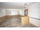 A bright living room with wood paneling, multiple windows, and modern ceiling lighting at 5502 Radnor Rd, Indianapolis, IN 46226