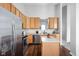Another view of the bright kitchen featuring stainless steel appliances at 6537 Amherst Way, Zionsville, IN 46077