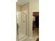 Bathroom with modern shower, tile surround, and walk-in closet offering a clean and functional space at 6691 Beekman Pl, Zionsville, IN 46077